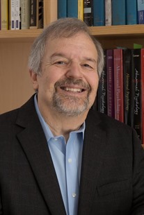 Headshot of Ronald J. Comer