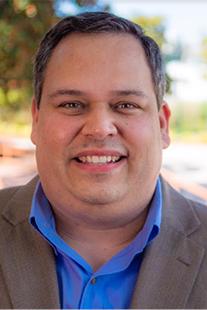 Headshot of Carlos Escobar