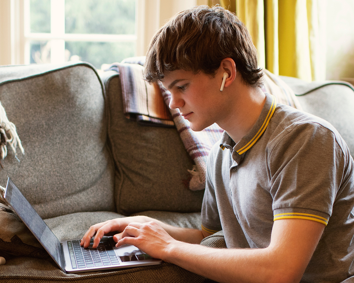 student studying on laptop