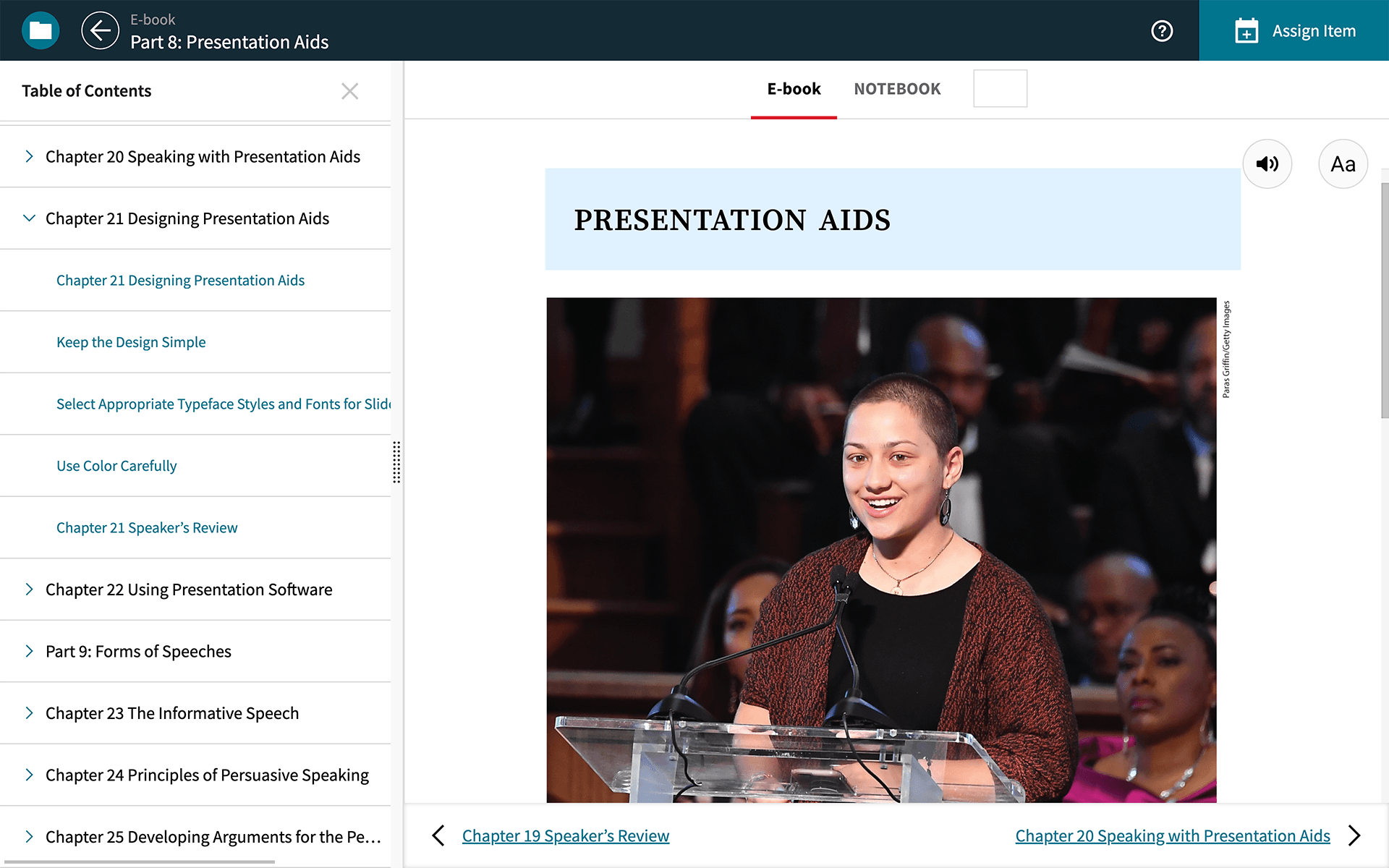 A screenshot of an E-book titled Part 8: Presentation Aids at Achieve shows a table of contents on the left. The page titled Presentation aids shows a photograph of a lady speaking at an event.