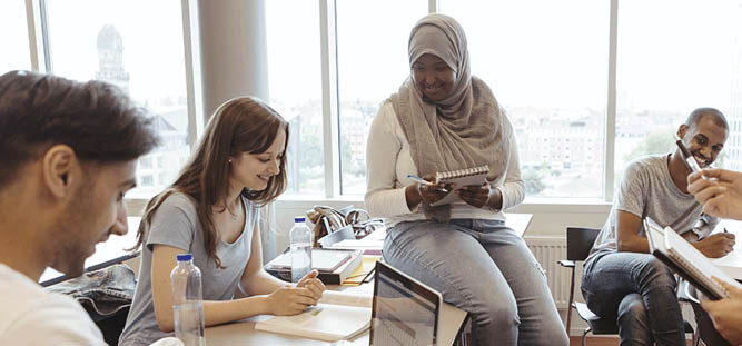 Diverse group of students in classroom