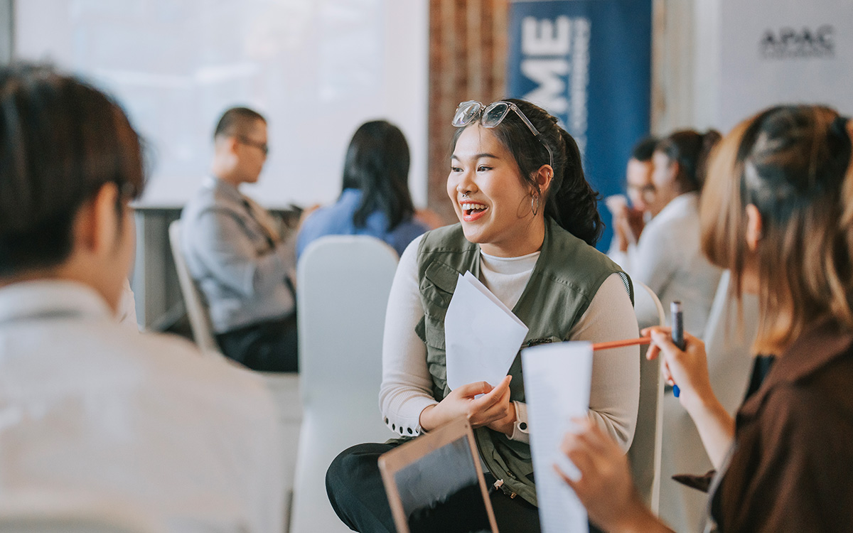 participants in small group discussion, brainstorming during a workshop