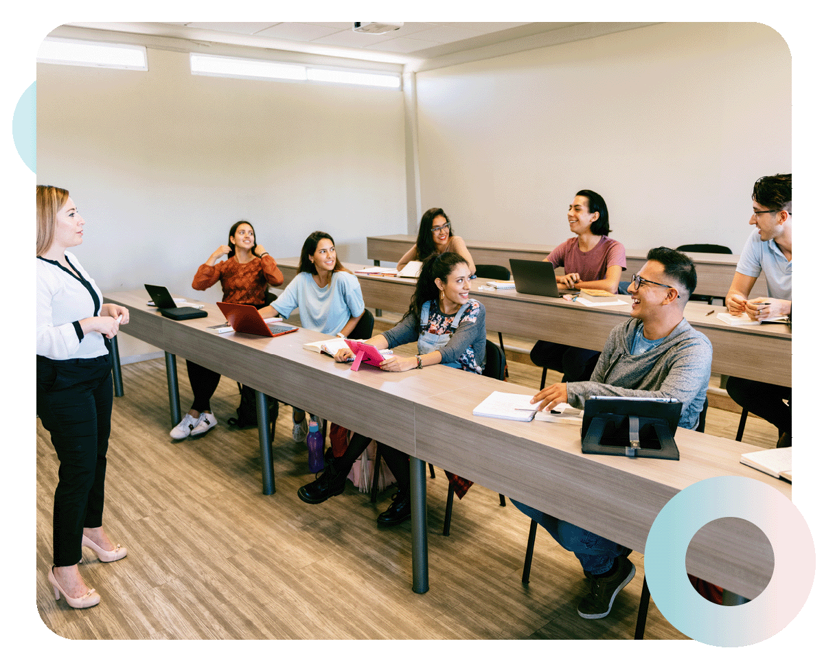 An instructor in front of a classroom of engaged students