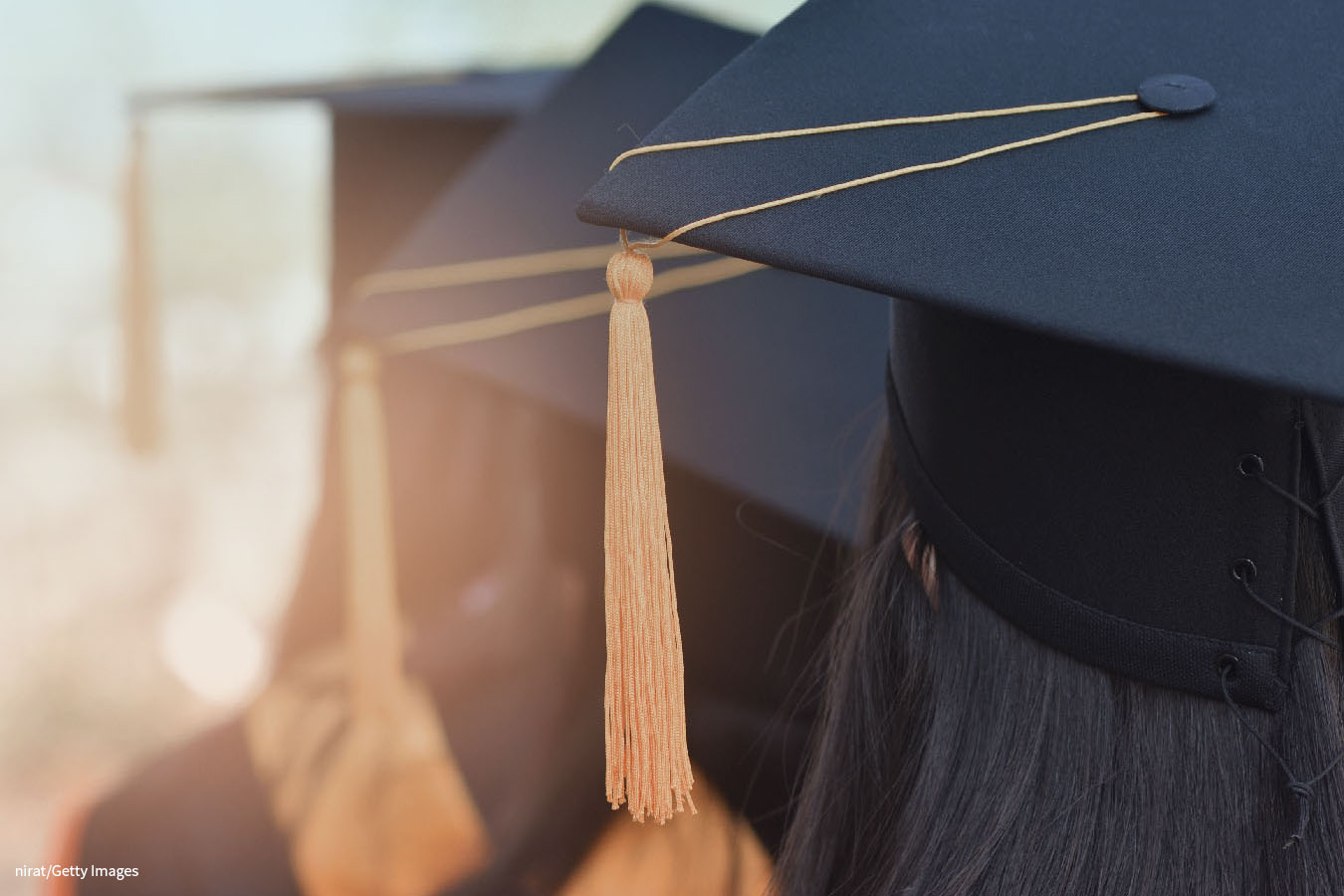 Student with graduation hats